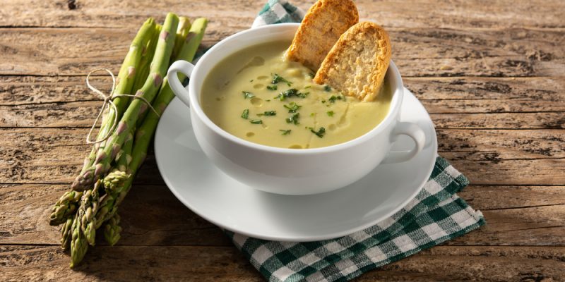 Fresh,Green,Asparagus,Soup,In,Bowl,On,Wooden,Table